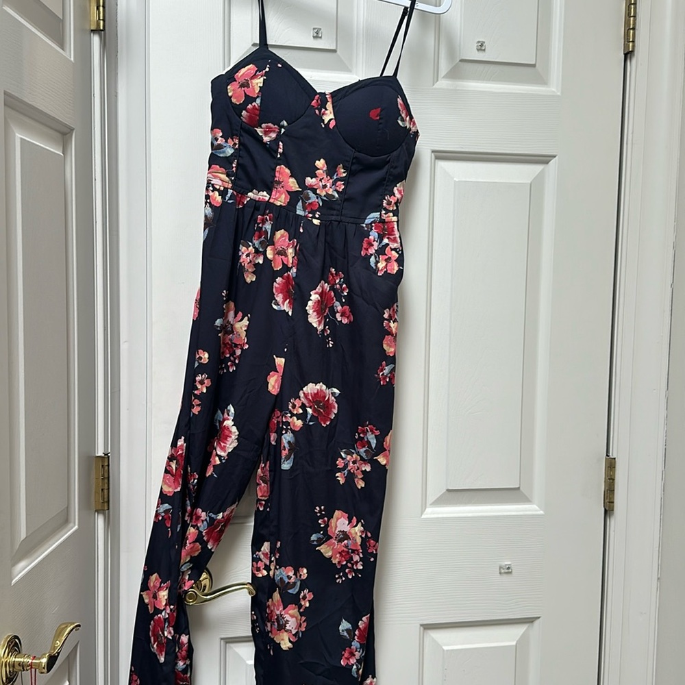 Adorable jumpsuit with flare bottoms very stylish